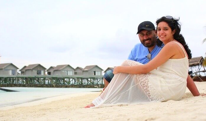 Angad and his wife on a beach in Maldives