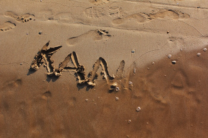 Kanikas name in the sand on a beach in Sri Lanka