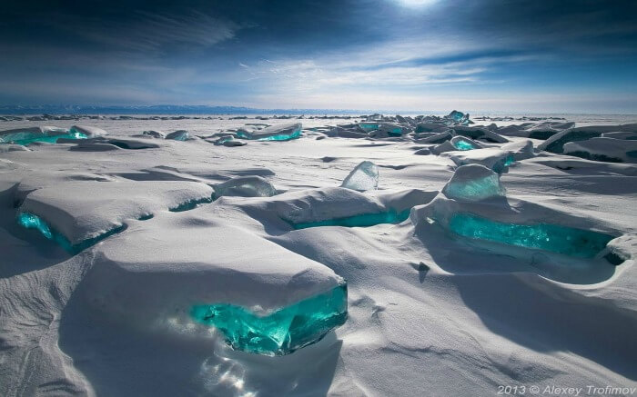 Lake Baikal gets frozen in winters and is a sight to behold with its turquoise ice.