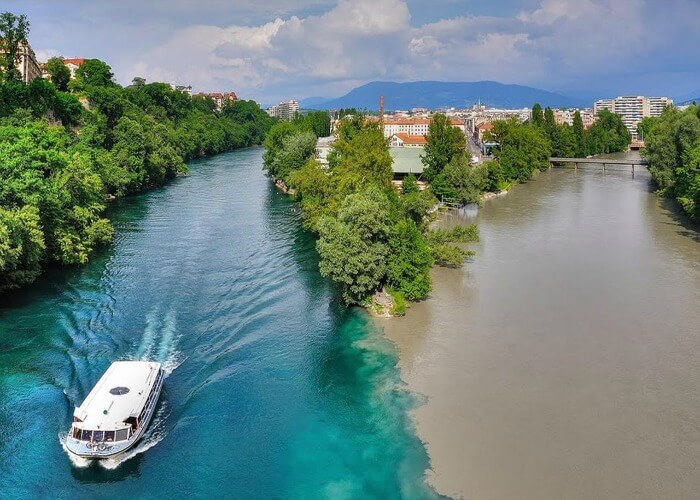 Spellbinding view of two different colors of rivers emerging together