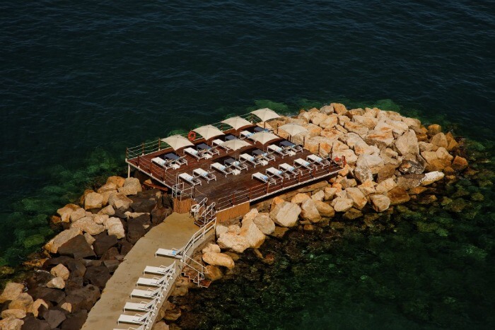 A deck by the sea at the Grand Cocumella
