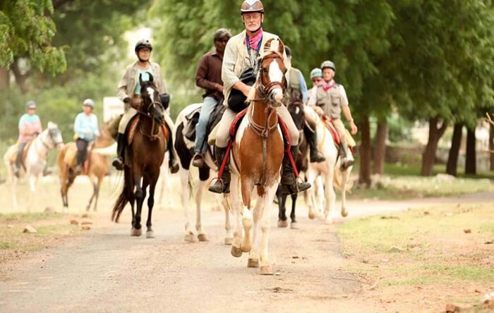 Tourists on a memorable horse safari in Rajasthan