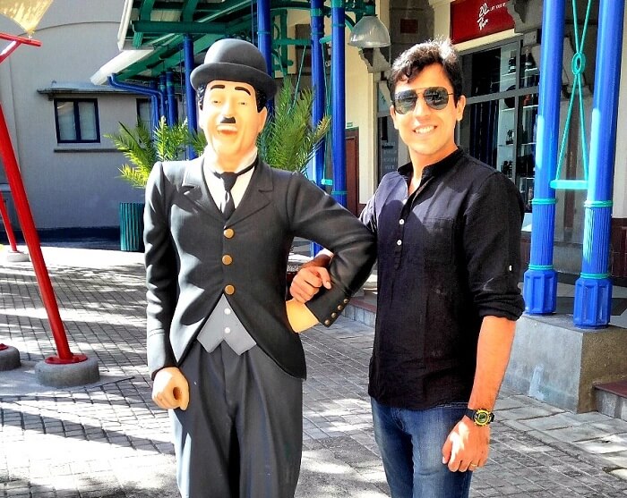Sumit with Charlie Chaplin statue