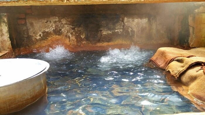 Food being cooked in Sulphur spring in Kasol