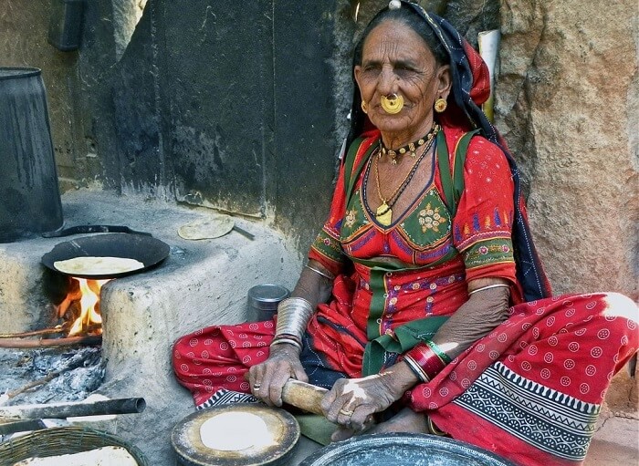 A local lady preparing meal for her family in rural area of Rajasthan