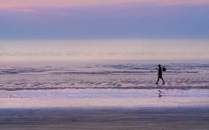 A local taking a stroll on Bordi Beach