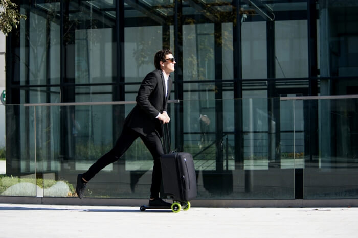 Wheeled bag opens up to turn into an easy scooter