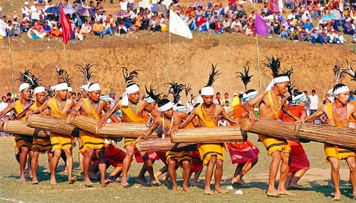 Local people dressed up in vibrant outfits to offer various offerings to the Sun God