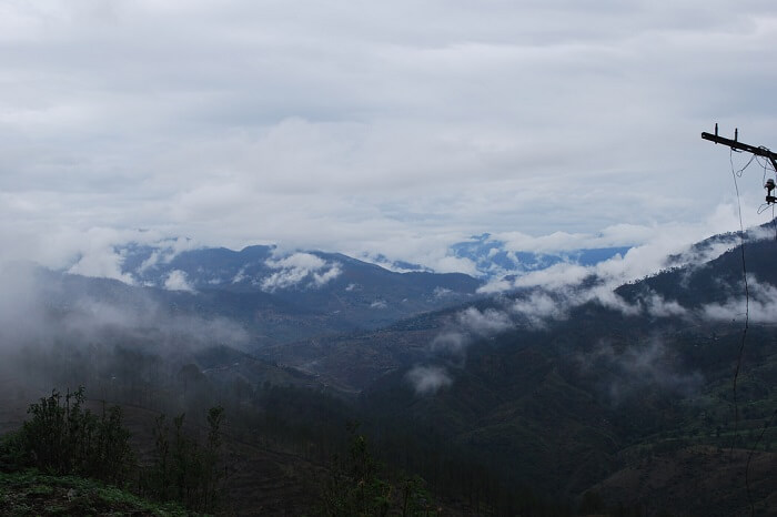 Mist takes cover over the hills of Binsar