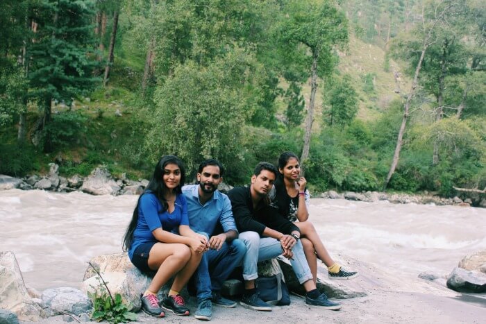 The entire group sitting near Parvati River