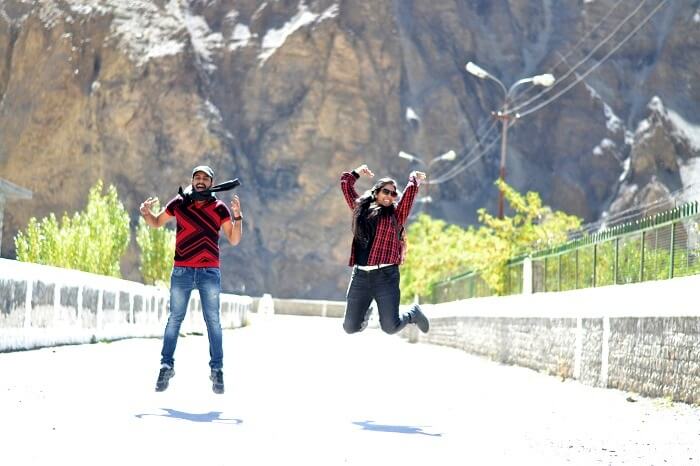 Avni and her friend jump for a photo