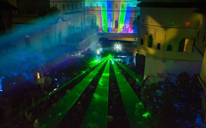 Colorful laser lights during Magnetic Fields Festival in Jaipur - one of the best places to visit in Rajasthan in winter