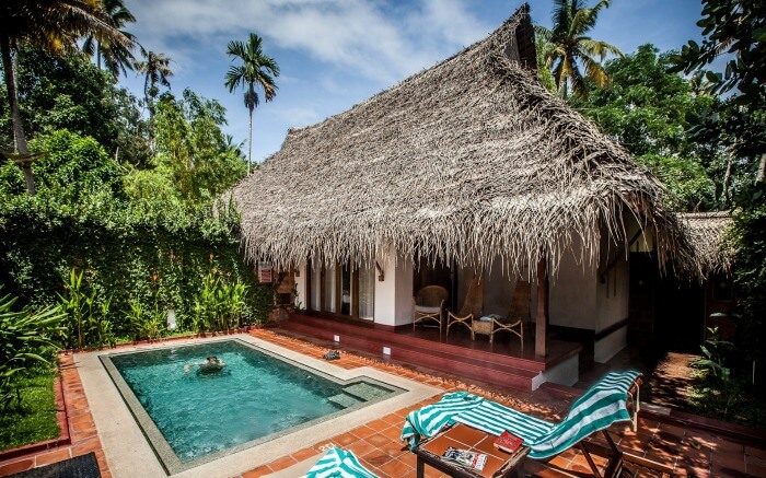 Pool and cottage in Marari Beach Resort