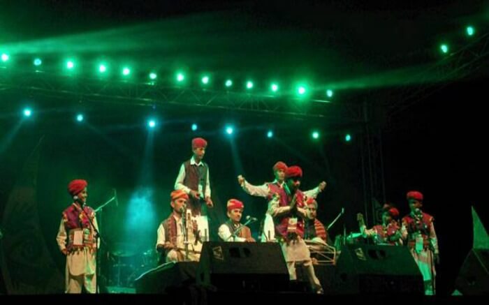 Artists performing during the Shree Sacred Festival in Pushkar which is one of the ideal places to visit in Rajasthan in December