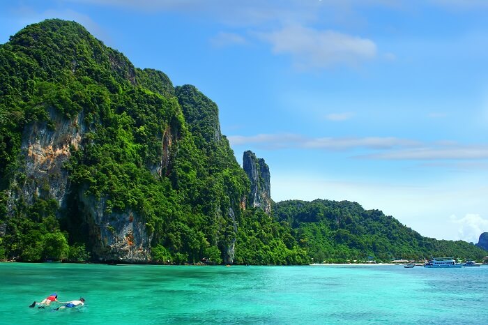 A couple takes a snorkeling tour at the Phi Phi island