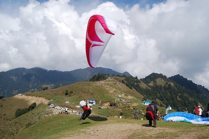Tourists try paragliding at Bir Biling in Himachal Pradesh