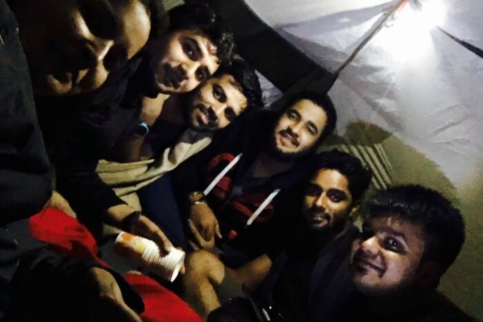 chilling with friends inside the tent