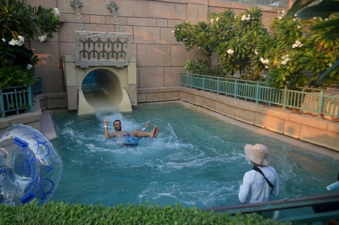 Man enjoying waterslide in Dubai