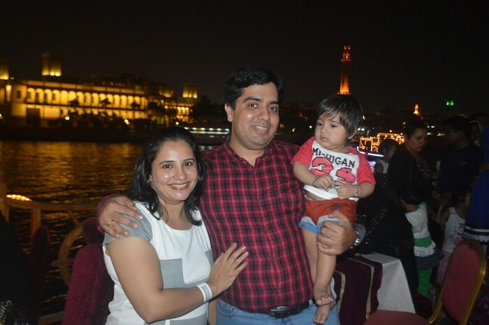 family enjoying dinner on cruise in Dubai