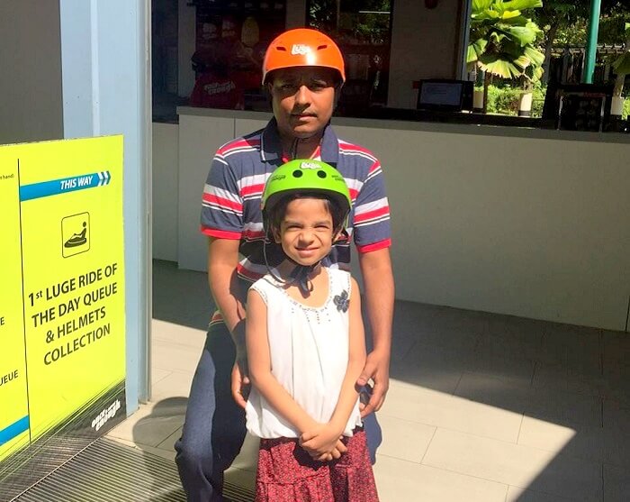 Govind and his kid at the sentosa island