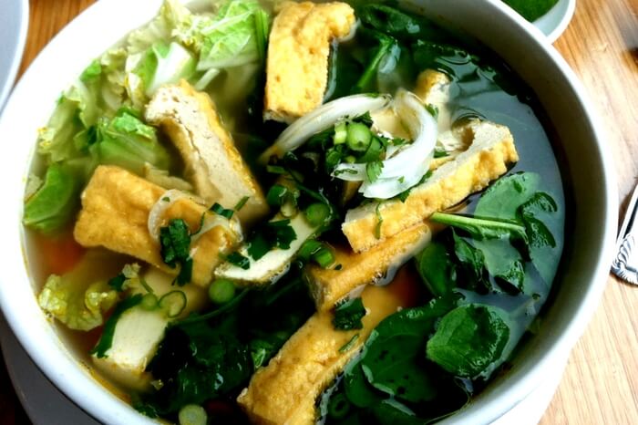 Vegan soup with veggies served at a restaurant in Portland