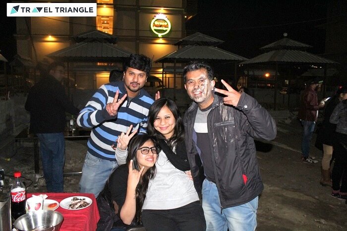 Travelers enjoying DJ night