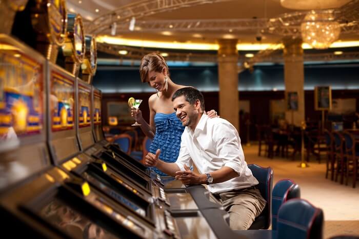 Romantic couple enjoying at a casino on honeymoon