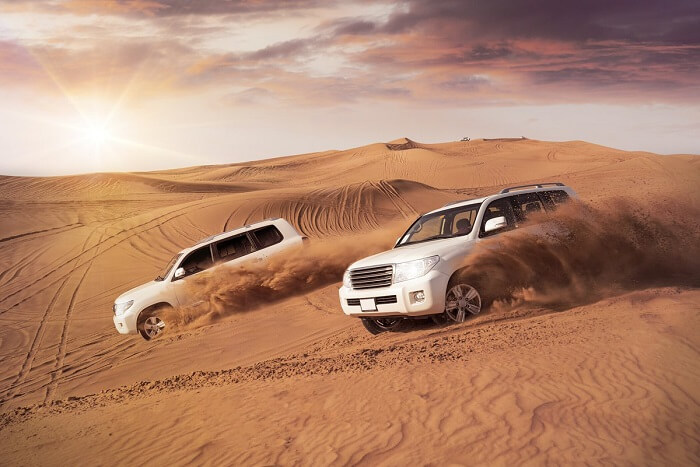 Honeymoon couple dune bashing in Dubai
