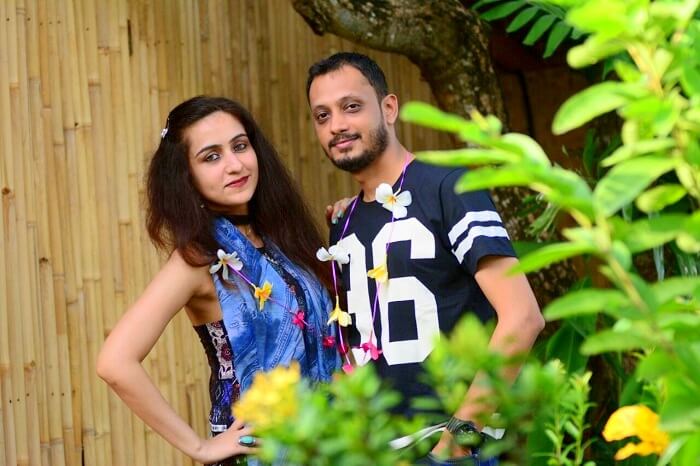 Sanchit and his wife smiling for the camera