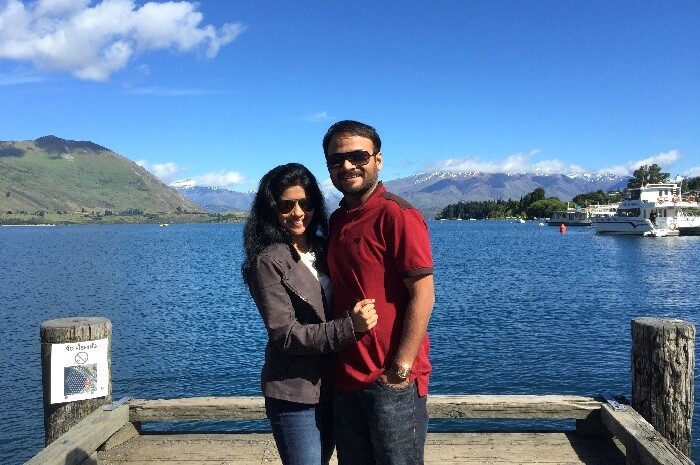 harsh and his wife pose for a photo in frank josef