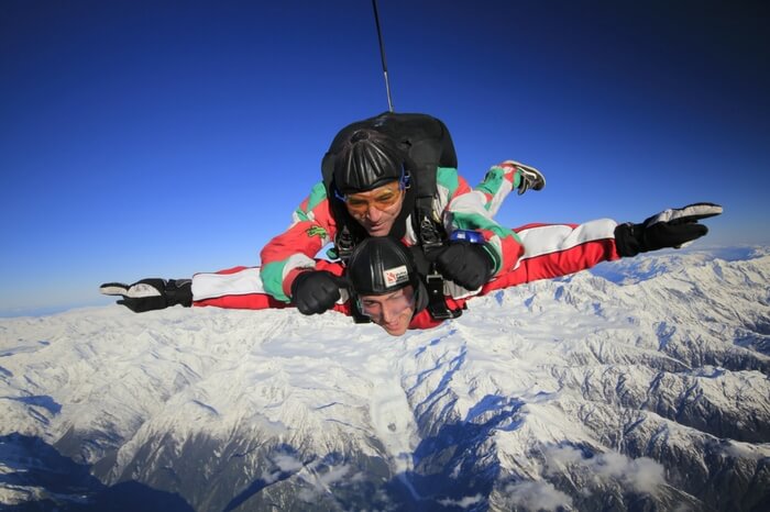 Skydiver enjoying diving session in the Franz Josef region in New Zealand