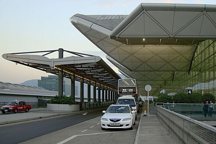 a white taxi at Hong Kong airport