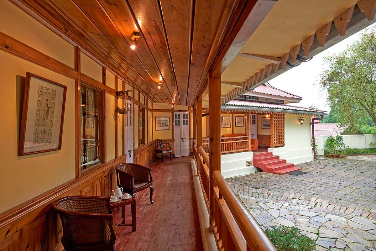 Bamboo sofas on the porch of Royal Heritage Tripura Castle
