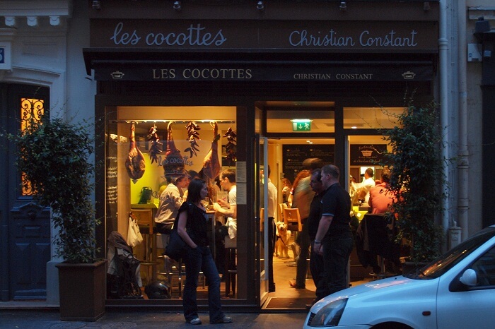 Guests entering the Les Cocottes de Christian Constant near Eiffel Tower in Paris