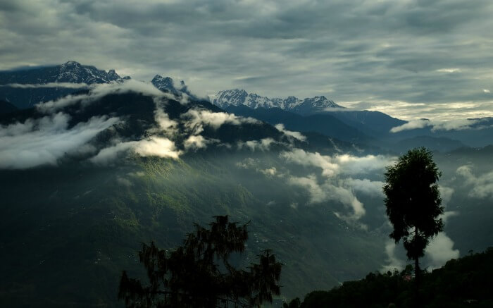 Cloud-kissed mountains in Pelling - one of the best mini moon destinations