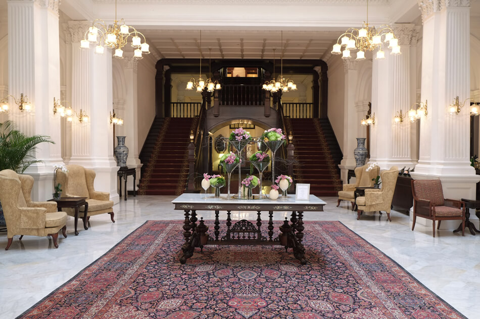 the lobby area of Raffles Hotel Singapore