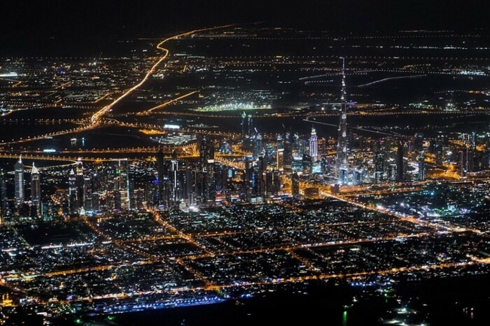 Top view of Dubai city from a helicopter at night