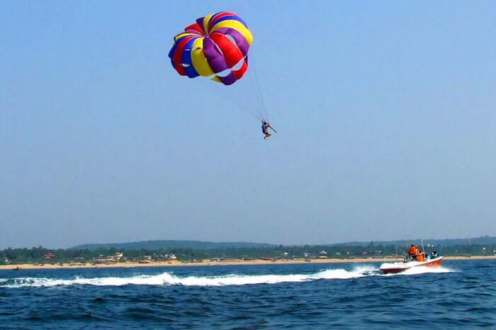 a guy parasailing over Arabian sea
