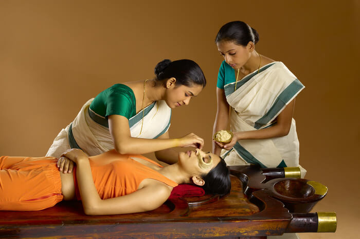 two Kerala women giving Ayurveda massage