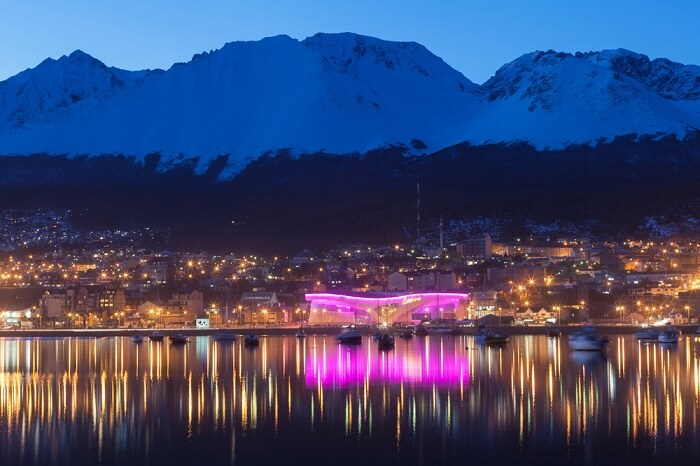 A night view of boats in the harbor at Ushuaia