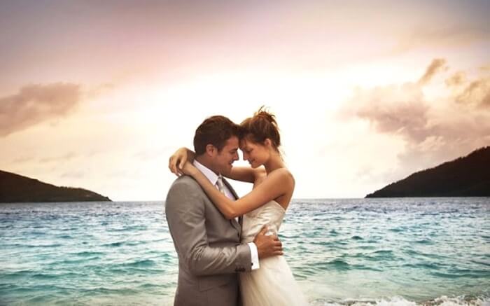Romantic couple by the beach in Hayman Islands