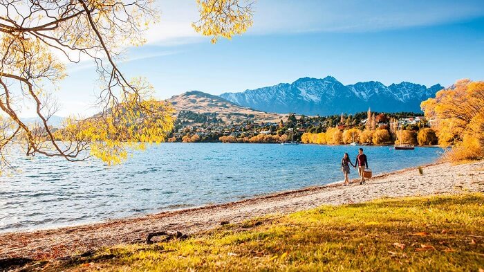 Romantic couple walking together in Queenstown