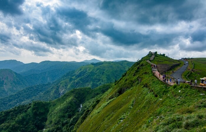 Tourists enjoying nature view in Parunthumpara Idukki