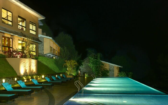 infinity pool at Poetree Sarovar Portico hotel in Thekkady