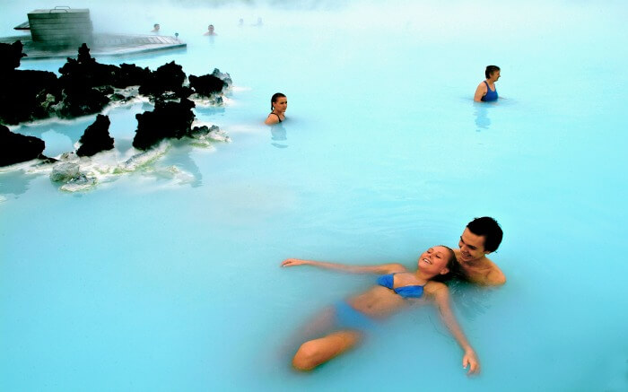 Couple enjoying romantic bath in Blue Lagoon in Iceland