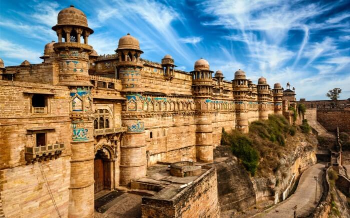Gwalior Fort under a cloudy sky