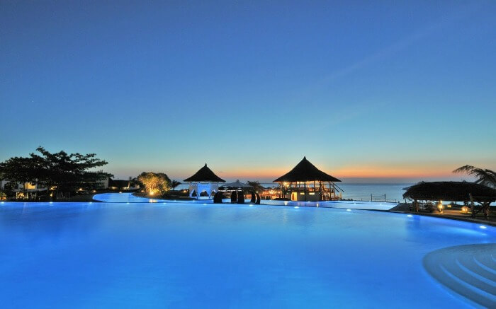 a vast pool in a resort overlooking the Indian Ocean