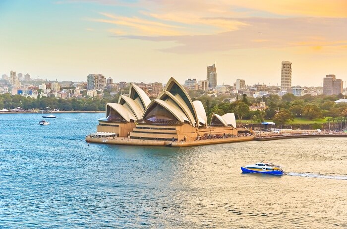 Ferries passing by the Sydney Opera House in Australia