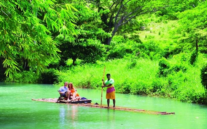 A couple sailing on Martha Brae River