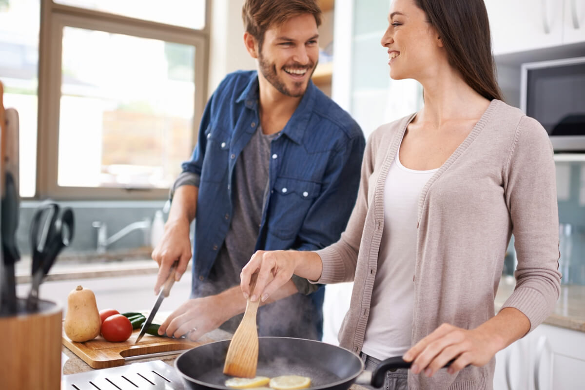 A couple cooking